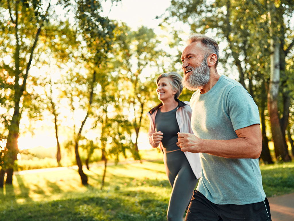 Mature couple going for a run